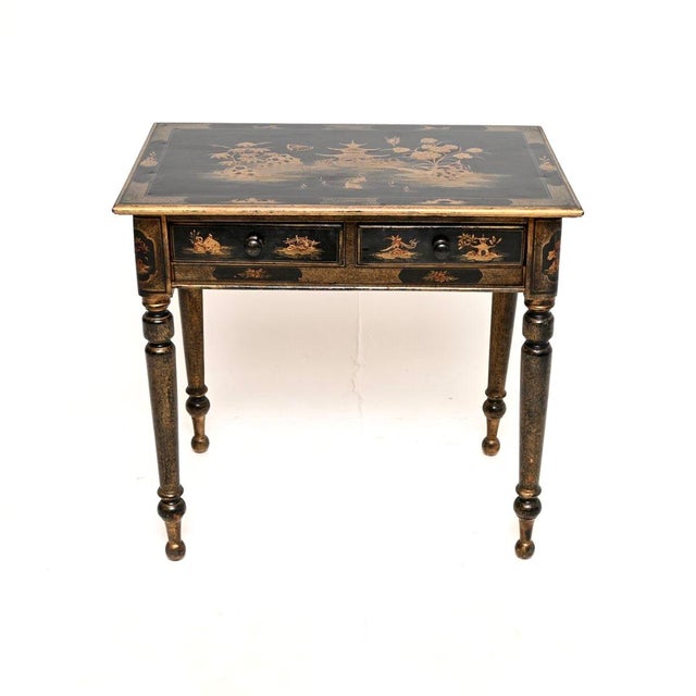 A gorgeous and very rare antique Victorian lacquered chinoiserie side table. This was made in England, it dates from...