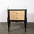 These exquisite Art Deco Directoire-style ebonized nightstands, crafted in France circa 1940, exemplify the sophisticated...