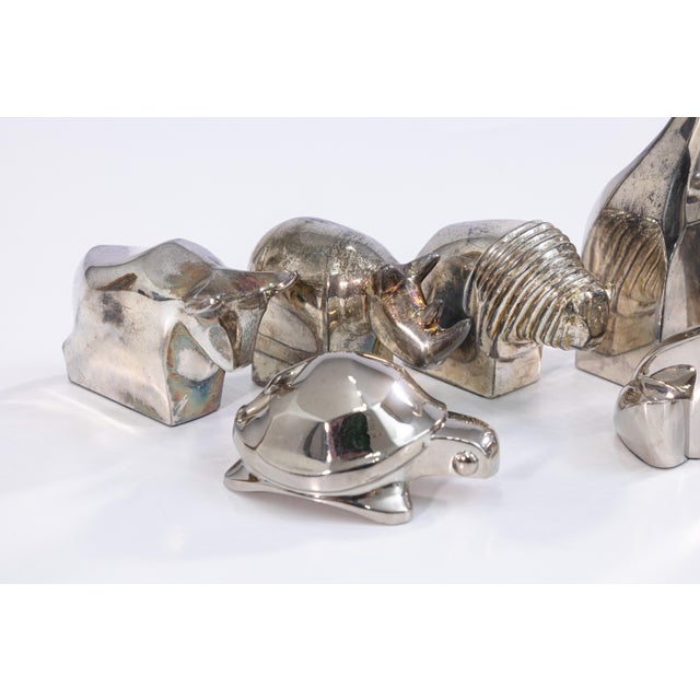 A set of 9 vintage 1970s Gunnar Cyren for Dansk zoo series silver plated animal paperweights. This is a very fun set of...