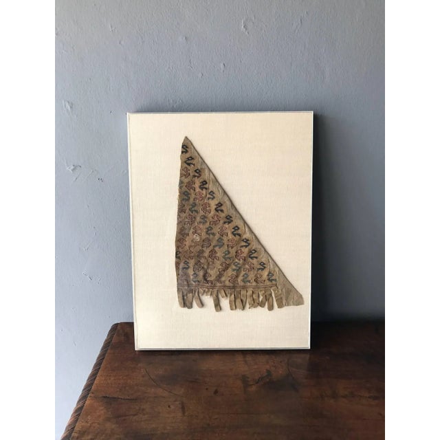 An antique pre-Columbia textile fragment likely from Peru Chancay culture in Central coast that thrived in the late...