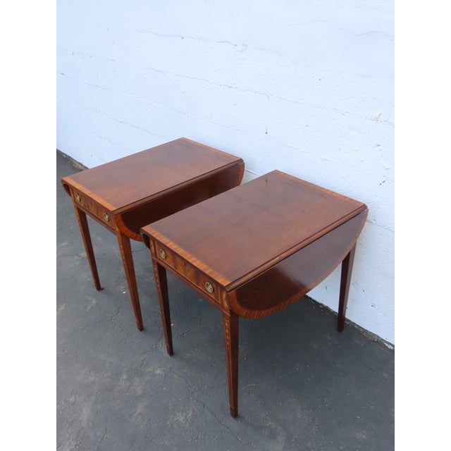 The The Tables made out of wood, solid wood, mahogany, and veneer. The Tables are labeled Wellington Hall. The Tables have...