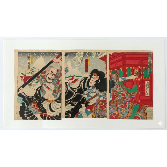 An electrifying and visually opulent original Meiji-era ukiyo-e triptych by Kochoro Toyosai (Kunisada III), depicting...