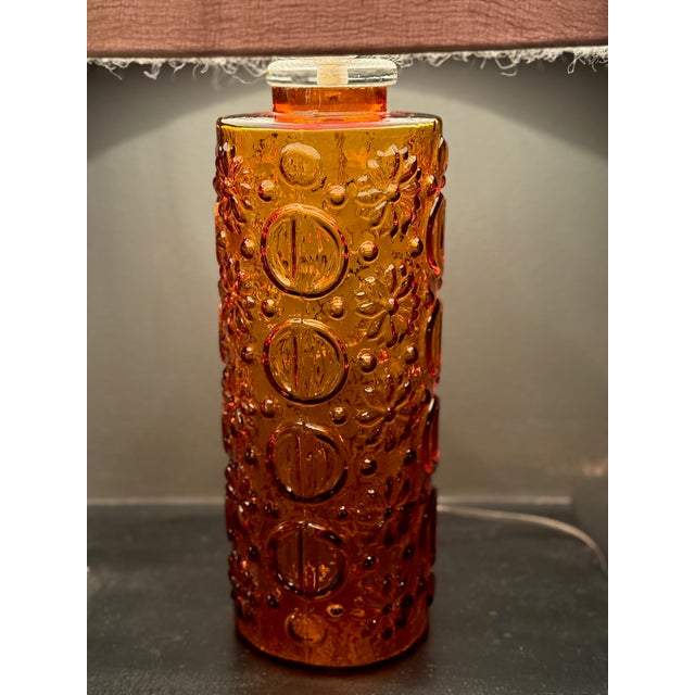 Orrefors Swedish Modernist Amber Colored Glass Table Lamp, made in Sweden. 1960s. Textured lamp base made of glass in...