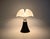 Black metal and plastic lamp by Gae Aulenti. Adjustable height: min: 70cm max: 90cm. Stamped under the lamp. Wear...