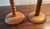 A pair of unique Victorian bobbin turned oak candlestick holders with turned round bases. 11" tall, base 4" wide.Brass...