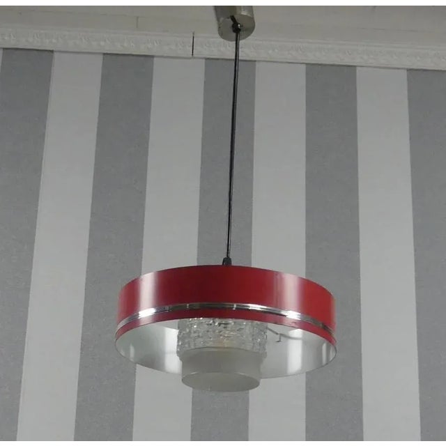 Cool little 70s ceiling lamp red round metal frame with chrome elements, typical ice glass dome a timeless eye-catcher...
