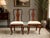 Elegant pair of vintage Ethan Allen dining chairs featuring classic Queen Anne styling and a warm cherry-toned finish....