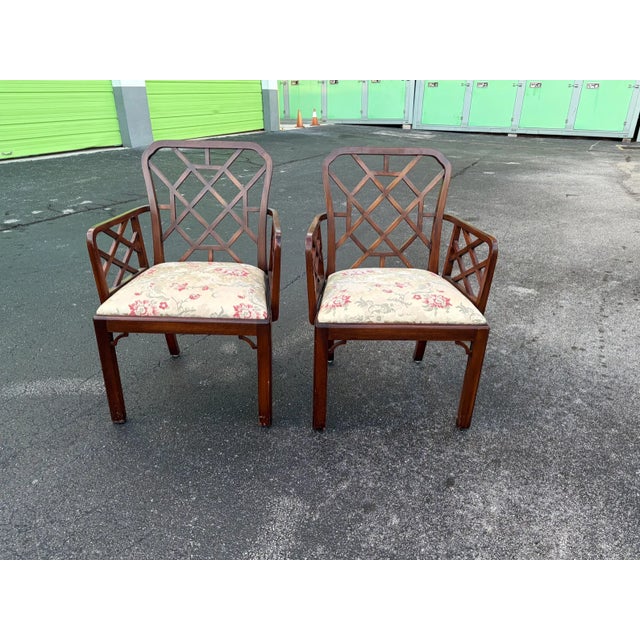 This is a very fine set of 8 Chinese Chippendale Fretwork dining chairs. These are solid wood with geometric fretwork...