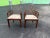 This is a very fine set of 8 Chinese Chippendale Fretwork dining chairs. These are solid wood with geometric fretwork...