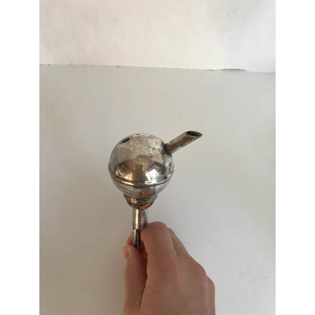 This listing is for ONE bottle pourer/stopper that appears to be silver-plated and marked England. It is perfect for using...