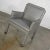 Fabulous modern gray faux leather modified Parson’s style armed accent chair on casters. Beautiful condition, keeping in...