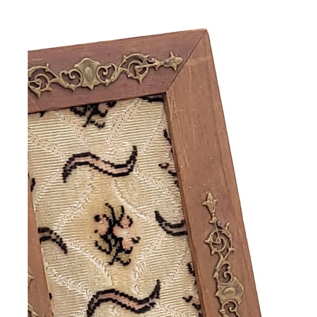 A curious wood and metal frame, circa 1900.