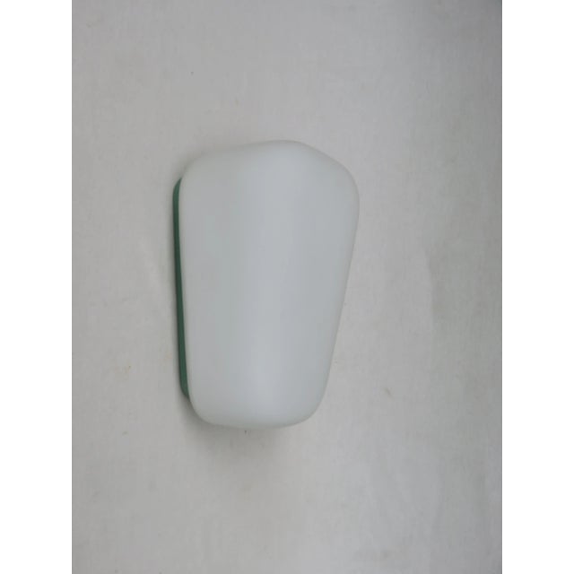 Outdoor lamp from the 60s the company bega. the wall mount made of aluminum alloy in hammerschlaglack metallic green, the...