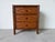 Charming vintage British Colonial style nightstand featuring a warm tortoise-style faux bamboo frame with woven rattan...