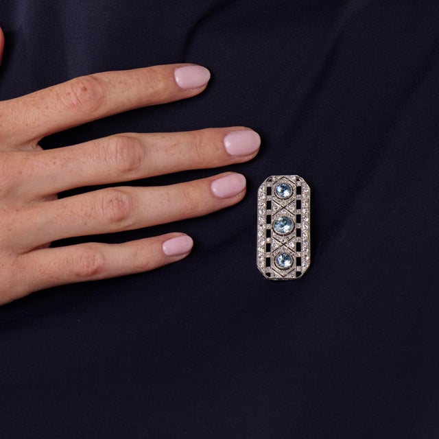 This exquisite French Art Deco aquamarine and diamond brooch is a beautifully elegant 1920’s jewel, designed with graceful...