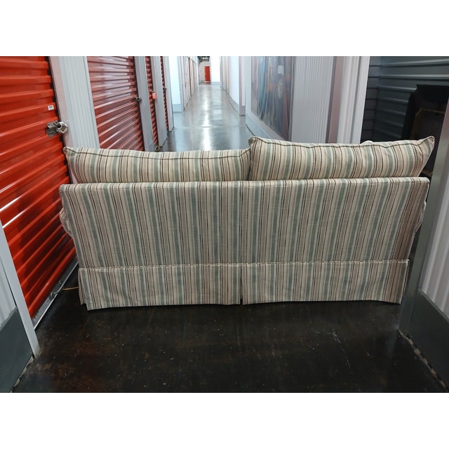 Relaxed styling with familiar touches and amazing comfort! This 2 seat style features loose back pillows, rolled sock arms...