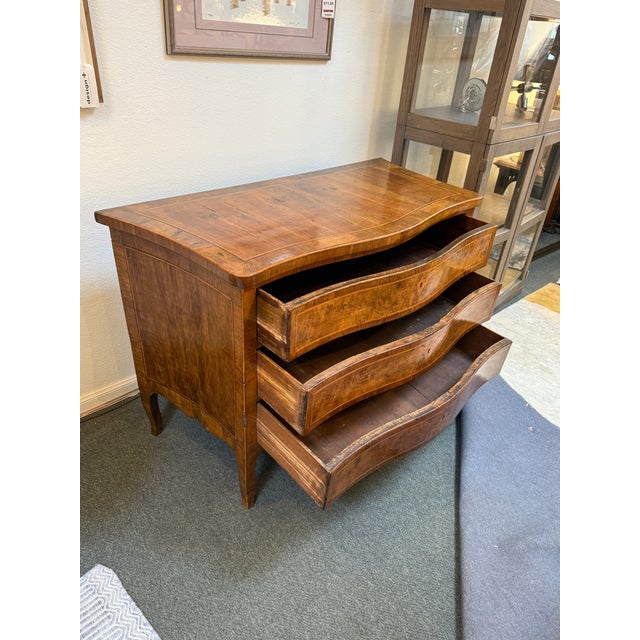 Design Plus Gallery presents an Antique Italian Commode likely from the 18th Century. This is a nice walnut chest of...