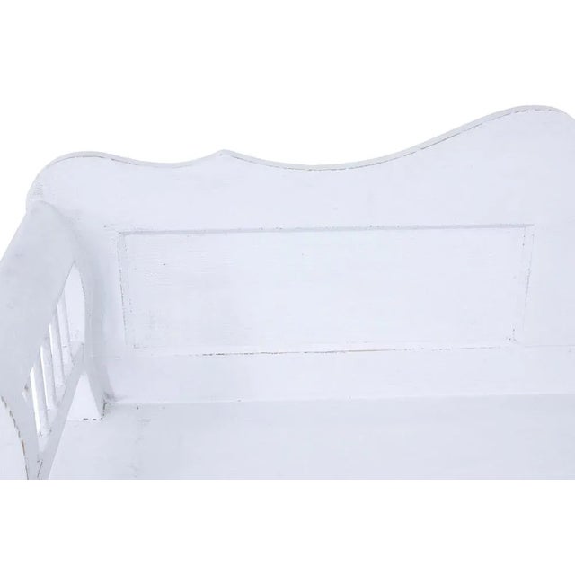 Gustavian inspired 19th century Swedish pine bench circa 1890. Elegant painted pine bench from the late 19th century, very...