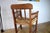 This is an antique rush-weave chair. It was made in Germany in the 1920s. The wooden frame is made of oak and has been...