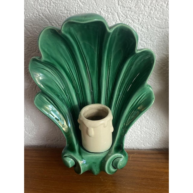 Pair of vintage ceramic wall sconces, typical of French artisanal production from the 1950s. Uncommon model. The main...