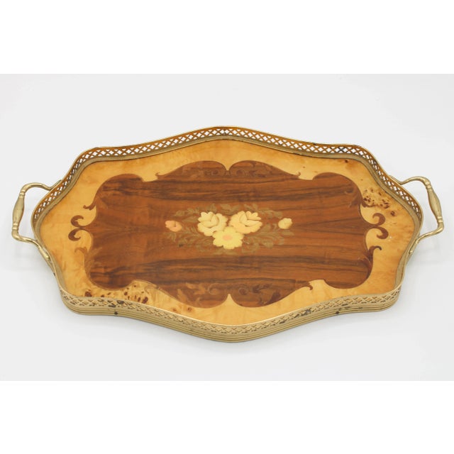 A stunning Italian Wooden Tray with beautiful marquetry design, circa 1950. This is a lovely tray that is a unique shape...