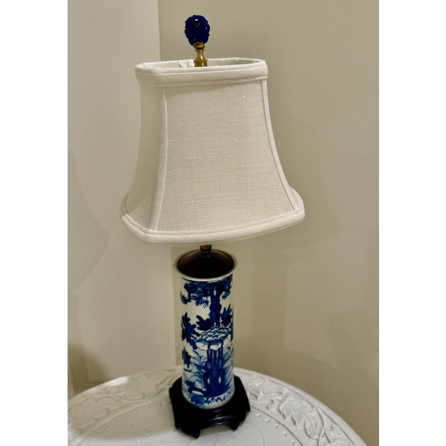 Pair of Chinese Blue and White Porcelain Table Lamps with Silk Shades This is an exceptionally elegant pair of very high-...