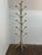 The stand holds twenty garments or hats. Wonderful store display for the vintage clothing dealer. Pine construction. Dowel...