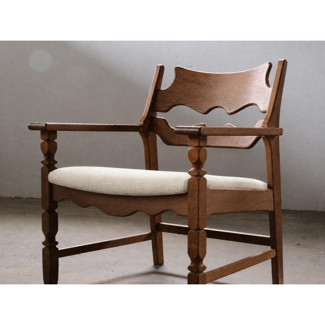 Henning Kjærnulf's lounge chair, known as the "Razorblade," epitomizes Danish Modern design from the 1960s. Crafted from...