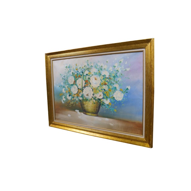 Lovely vintage mid-century impressionist oil on canvas painting beautifully captures a large floral arrangement nestled...