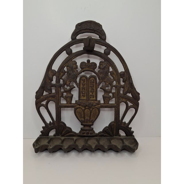 This exceptional, heavy cast brass bench-style Hanukkah lamp represents the pinnacle of 19th-century Eastern European...