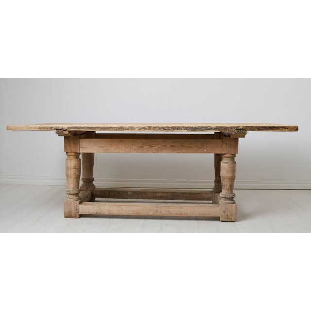 Very early and rare large table from the Swedish baroque period. This very rare table is an early antique from around 1750...