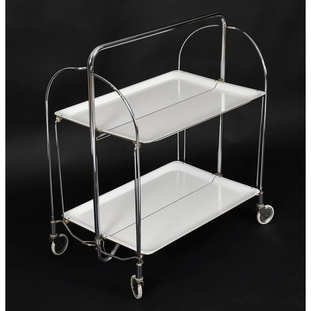 A vintage Bremshey Gerlinol 'Dinette' folding serving / drinks trolley. Produced by Bremshey AG, Sollingen, Germany in the...