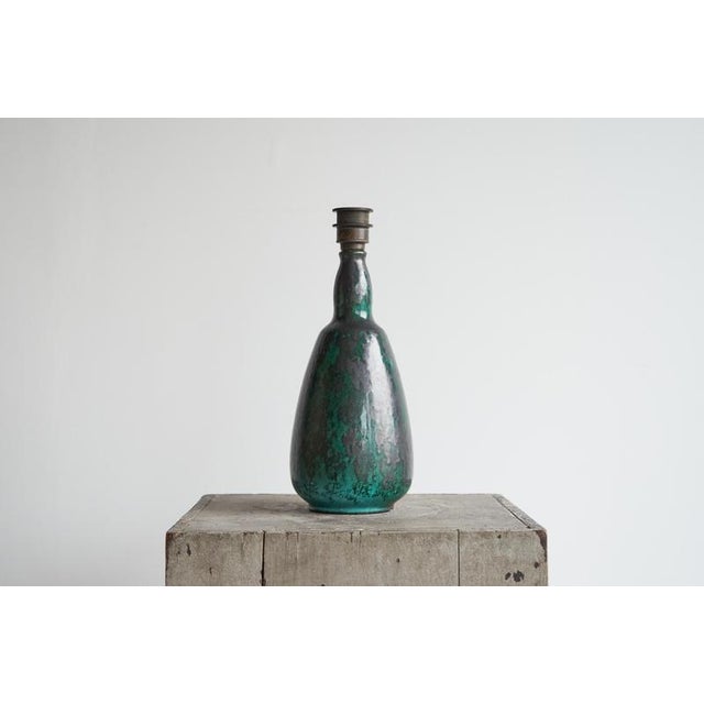 Early 20th century green glazed studio pottery table lamp 1930s this is an early 20th century glazed table lamp in cloudy...