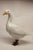 Ceramic Italian goose with metal legs.