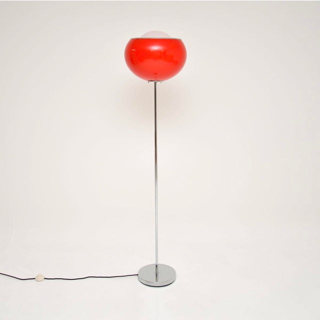A stylish and very rare vintage Italian floor lamp by Harvey Guzzini. This was made in Italy and dates from around the...