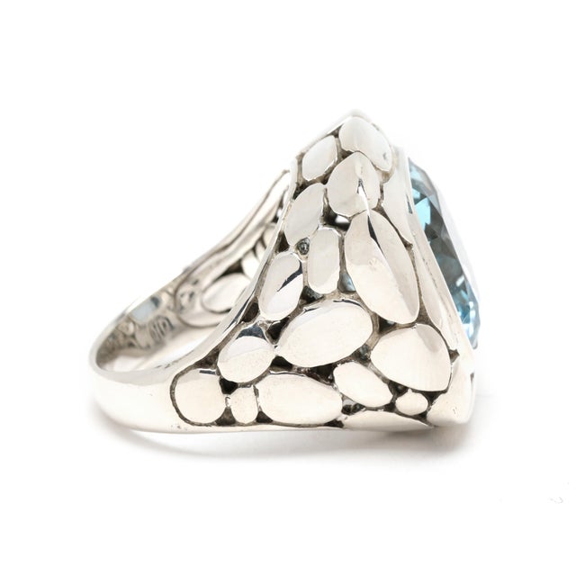 Stones: blue topaz Ring Size 6 Rise Off Of Finger: 9 mm Length: 22 mm Weight: 10.9 dwts. / 16.9 grams Stamps: "JH 925"...