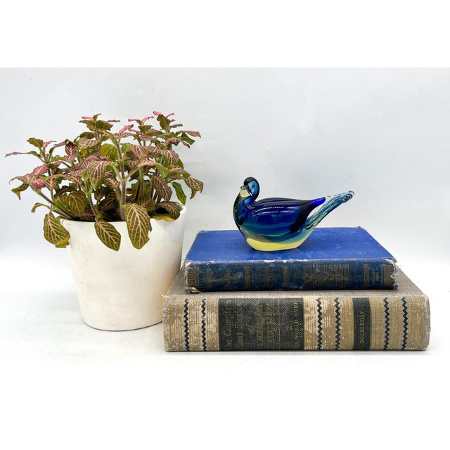 Sensational glass sculpture of a bird made in Italy the mid-late 20th century. Gorgeous cobalt blue coloring embedded into...
