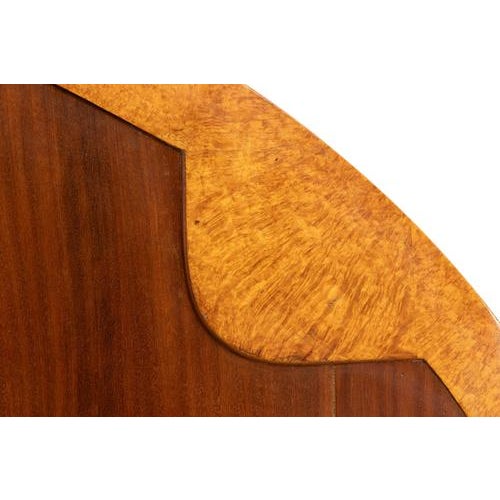 A rare, superb bed designed and realized by Jules Leleu in 1923, and known in only two specimens. Mahogany and amboyna...