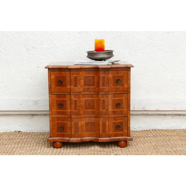 This exquisite Mid-Century Italian commode balances classic European elegance with clean, transitional proportions....