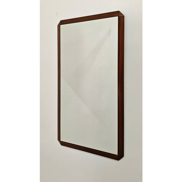 Rectangular wooden wall mirror, featuring a design characterized by clean, essential lines and a high-quality wooden...