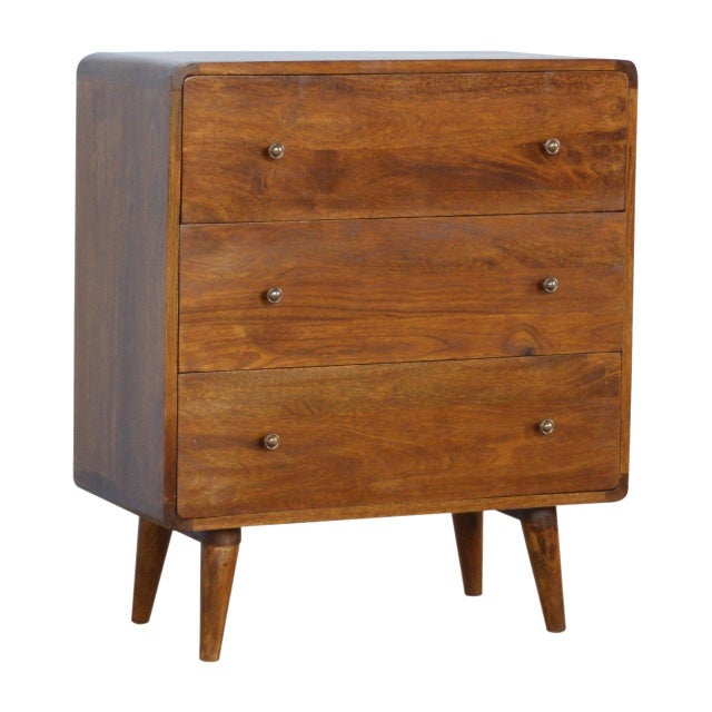 This elegantly curved chest of drawers brings a soft, architectural presence to the bedroom or living space. Crafted from...