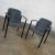 Striking pair of vintage modern Herman Miller chrome & black armchairs wearing their original gray iridescent fabric....