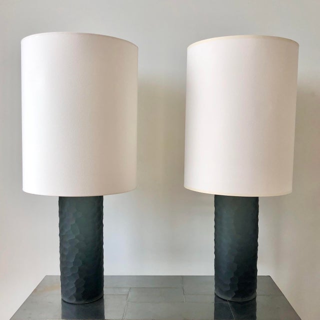 Pair of lamps by Vivarini in a deep blue Murano battuto glass. When they catch the light, the translucent cylinders...