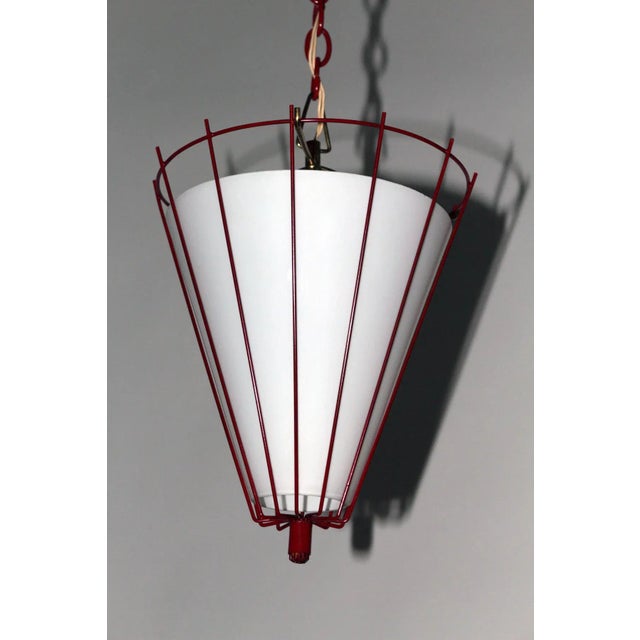 - Kitchen lamp from the 1950s - Burgundy painted metal basket with conical white opal glass insert - Brass chain and...