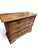 A refined 17th-century commode/chest of drawers from central Italy, crafted in solid walnut and veneered with beautiful...