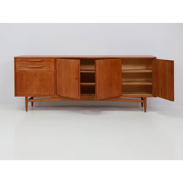 Swiss Design Sideboard in Teak, 1960s, in Very Good conditions. Designed 1960 to 1969 This piece has an attribution mark,...