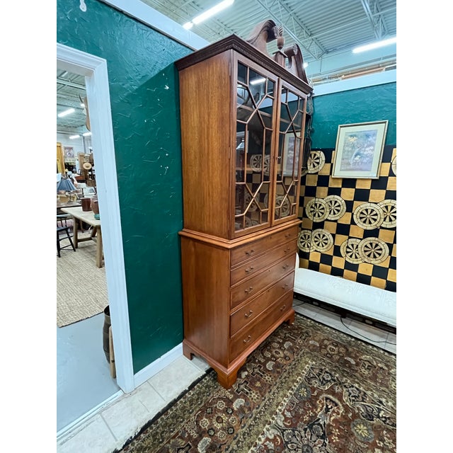 A handsome and impressive antique secretary bookcase desk, crafted in rich, warm-toned finish with beautifully figured...