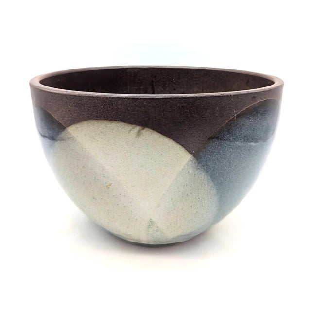 Offered is a vintage 1970s Pottery Craft #123 bowl/planter. The rich brown glaze on the stoneware contrasts with the...