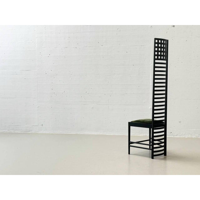 This chair is the Hill House 1 model, designed by Charles Rennie Mackintosh in 1902 for Hill House in Helensburgh,...