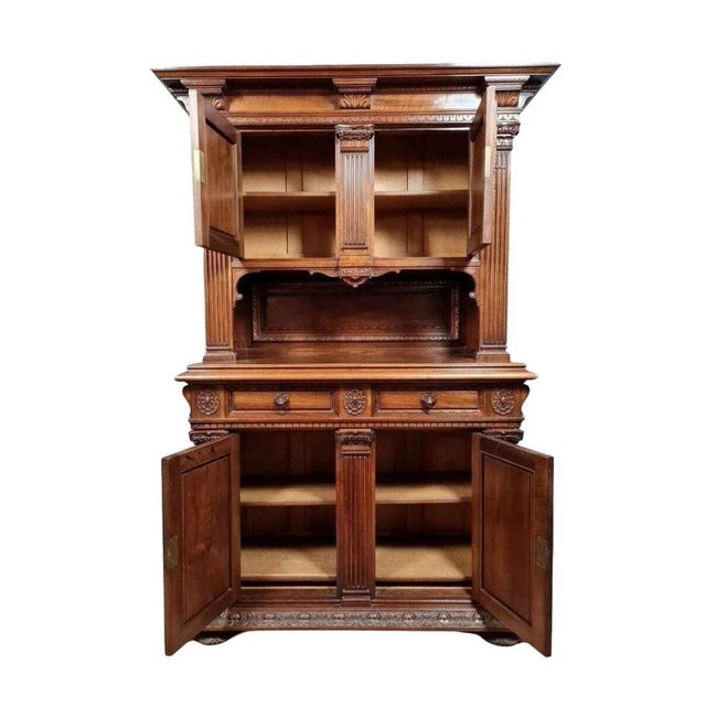 Two-piece Renaissance-style solid walnut sideboard Two-piece Renaissance-style solid walnut sideboard, circa 1850 Front...